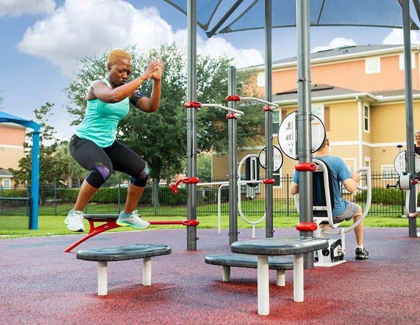 People working out at a FitLot Outdoor Fitness Park